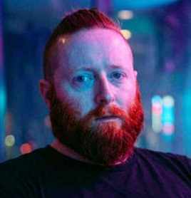 Adam K Dean